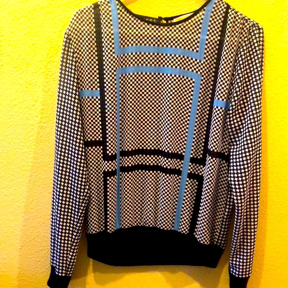 Beautiful blouse from Micheal kore.